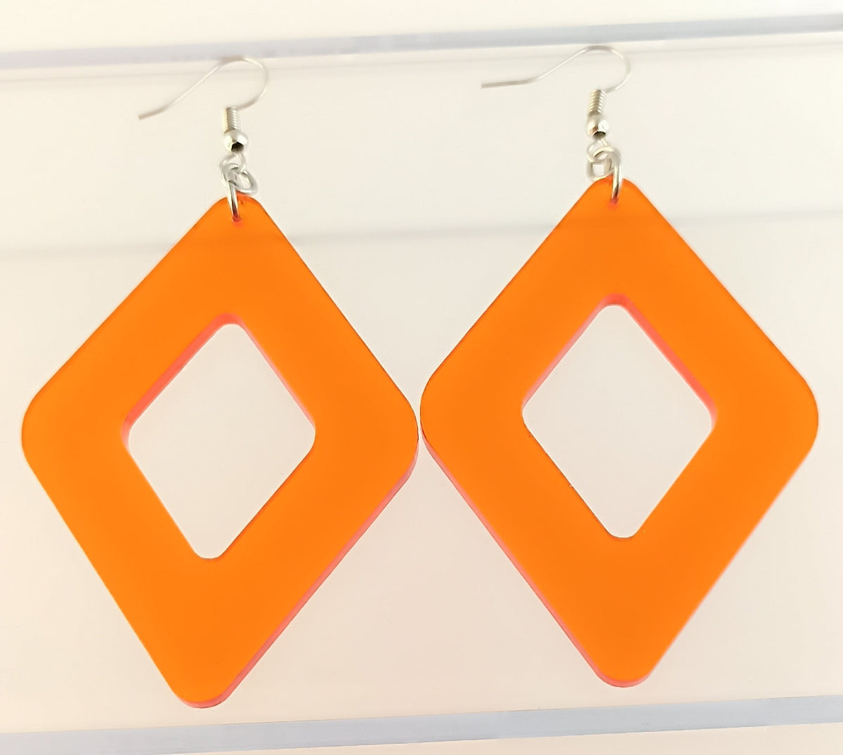 statement-ohrringe-vintage-80er_jahre-80er-xxl-eckig-silber-edelstahl-orange-transparent